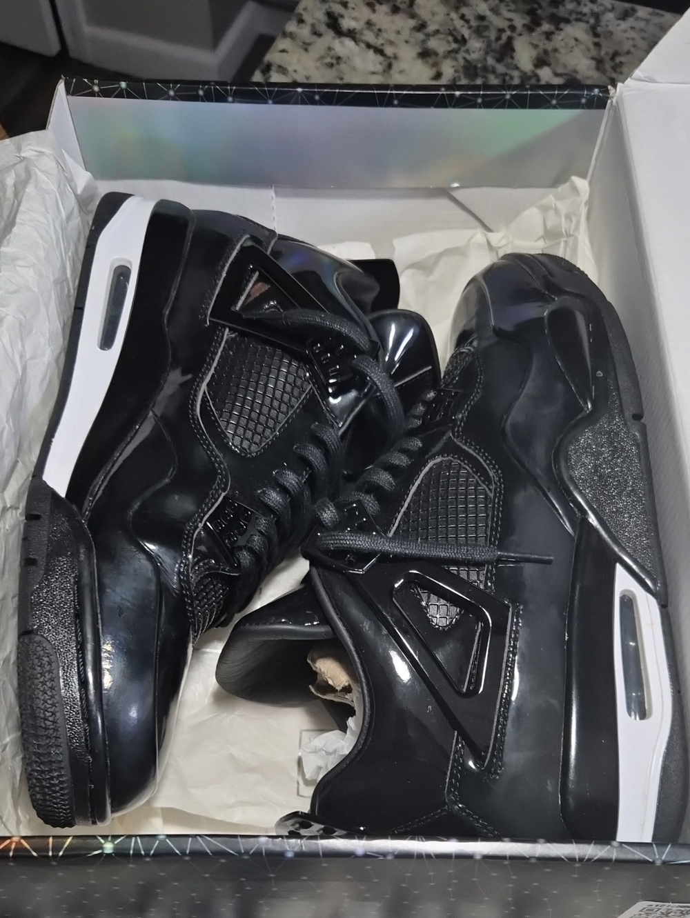Jordan Men's Black and White High-Top Sneakers